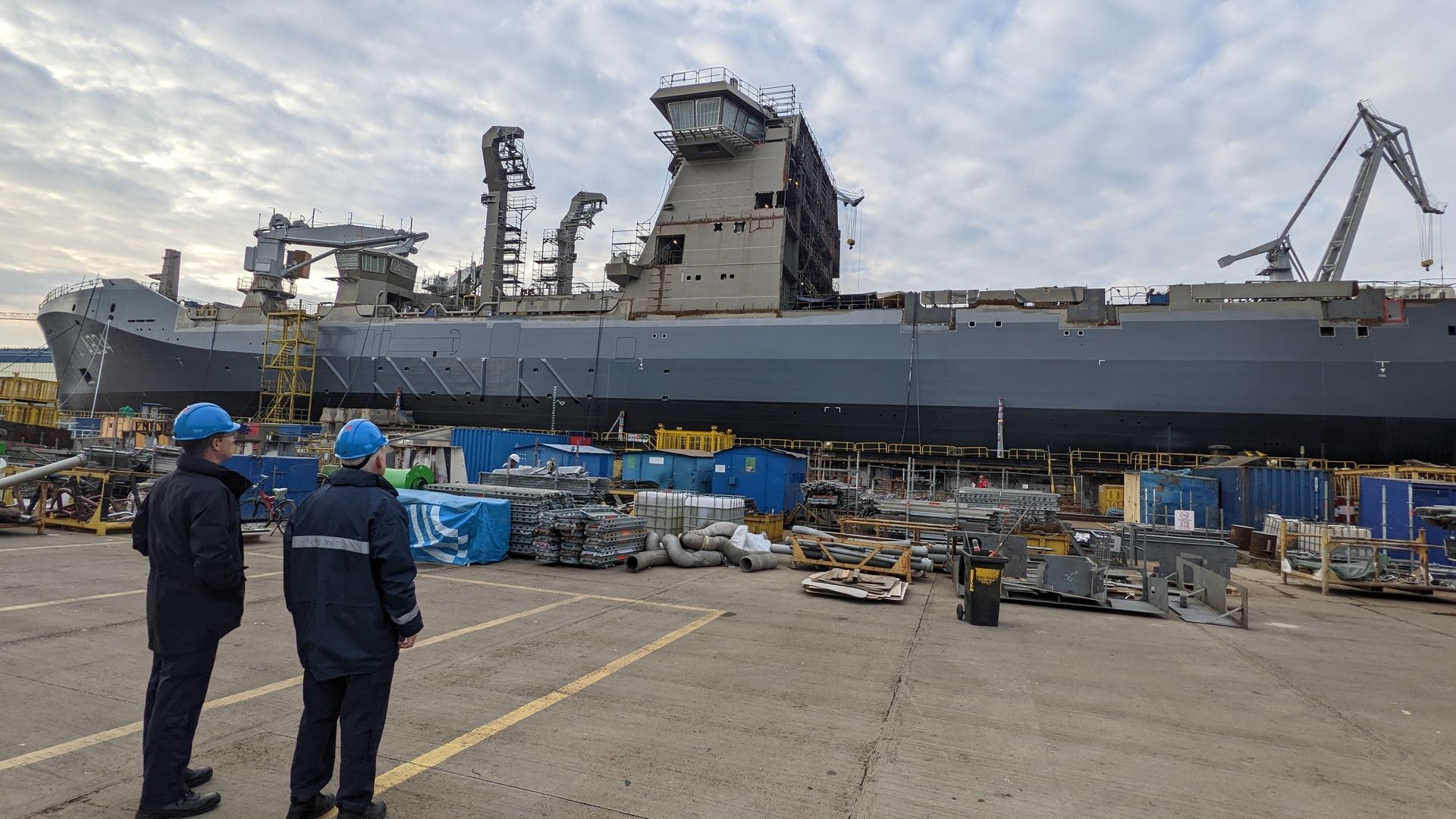 The Royal Netherlands Navy Joint Logistic Support Ship (JSS) Karel Doorman arriving in Freetown, Sierra Leone with a consignment of vehicles to help in the fight against Ebola in the region.The Karel Doorman is a support ship with the Royal Netherlands Navy and is equipped with a crane and lift to hoist heavy materiel. The ship can transport about 5,000 tonnes of heavy rolling (armoured) materiel and has a hospital with two operating theatres. The JSS also has landing pads for helicopters, such as Chinooks, Cougars and the NH90.